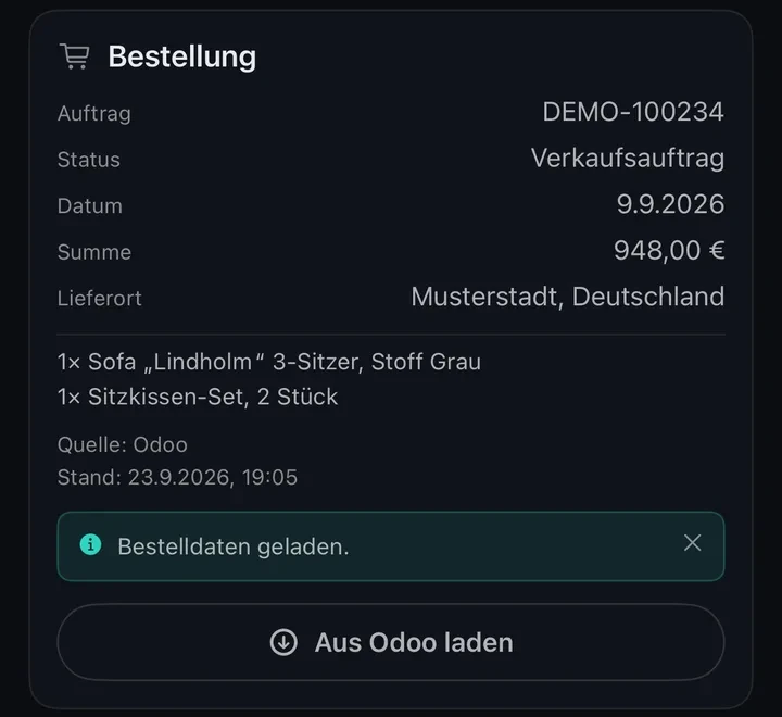An order in Conciva, loaded from Odoo: order DEMO-100234, status sales order, date 9.9.2026, total 948.00 €, delivery place Musterstadt, Germany. Lines: 1× sofa “Lindholm” three-seater in grey fabric and 1× seat cushion set, 2 pieces. Below: source Odoo, as of 23.9.2026, 19:05, the note “Bestelldaten geladen.” and the button “Aus Odoo laden”.